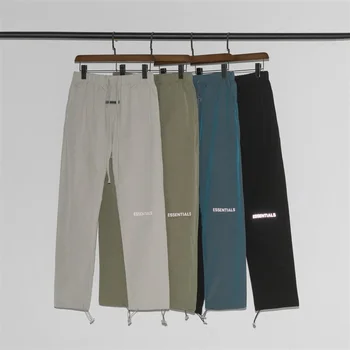 Mehed Naiste Essentials Püksid Kõrge Kvaliteedi Peegeldav Logo Nailon Sweatpants Ameerika Hip-Hop Streetwear ESSENTIALS Cargo Püksid